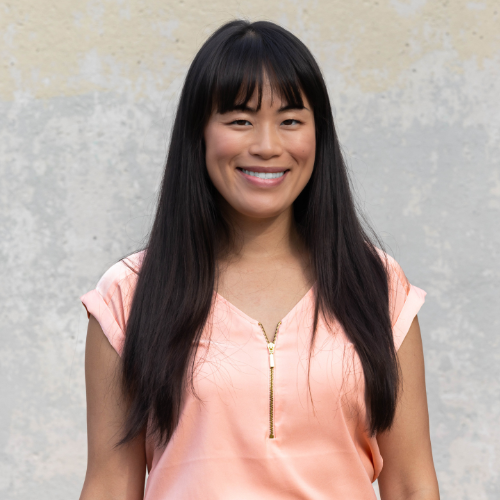 female with long hair smile